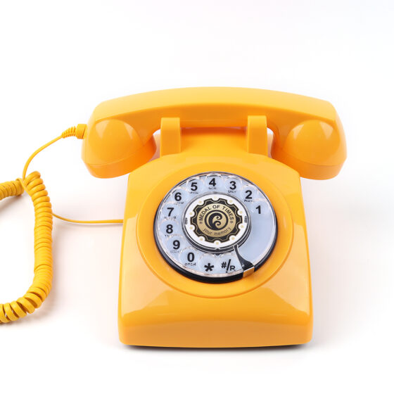 Rotary Dial Telephone CT-8019, yellow vintage rotary dial Telephone, front view.