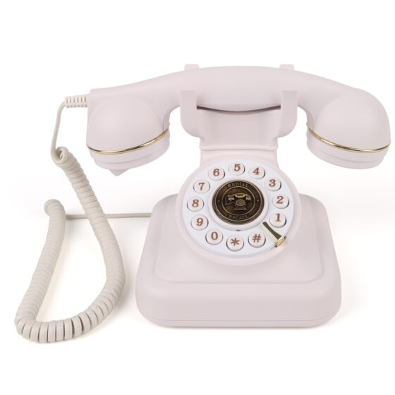 Vintage Round Button Landline Telephone CT-8022, retro pink push-button Telephone, front view.