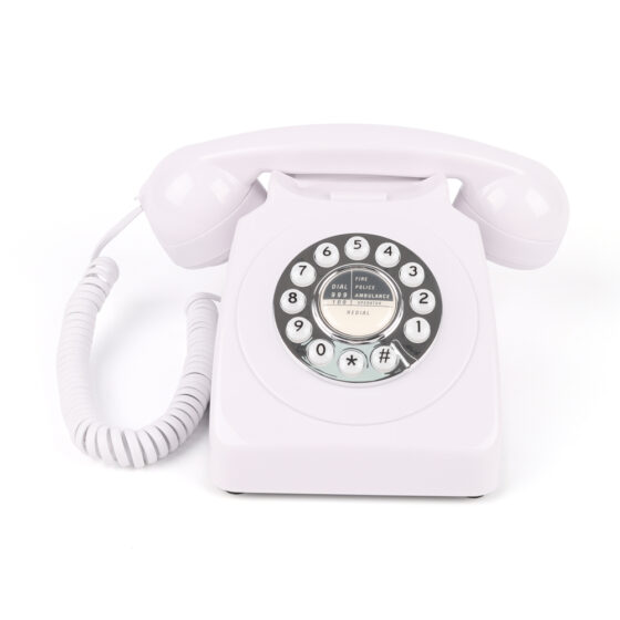Angled view of Western Style Push Button Telephone CT-8019 in white, featuring a classic rotary dial and push-button design.